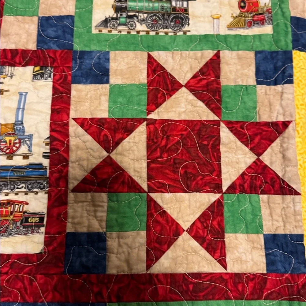 Handcrafted child's crib or lap quilt